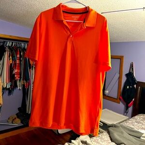 Men’s bright orange polo golf shirt